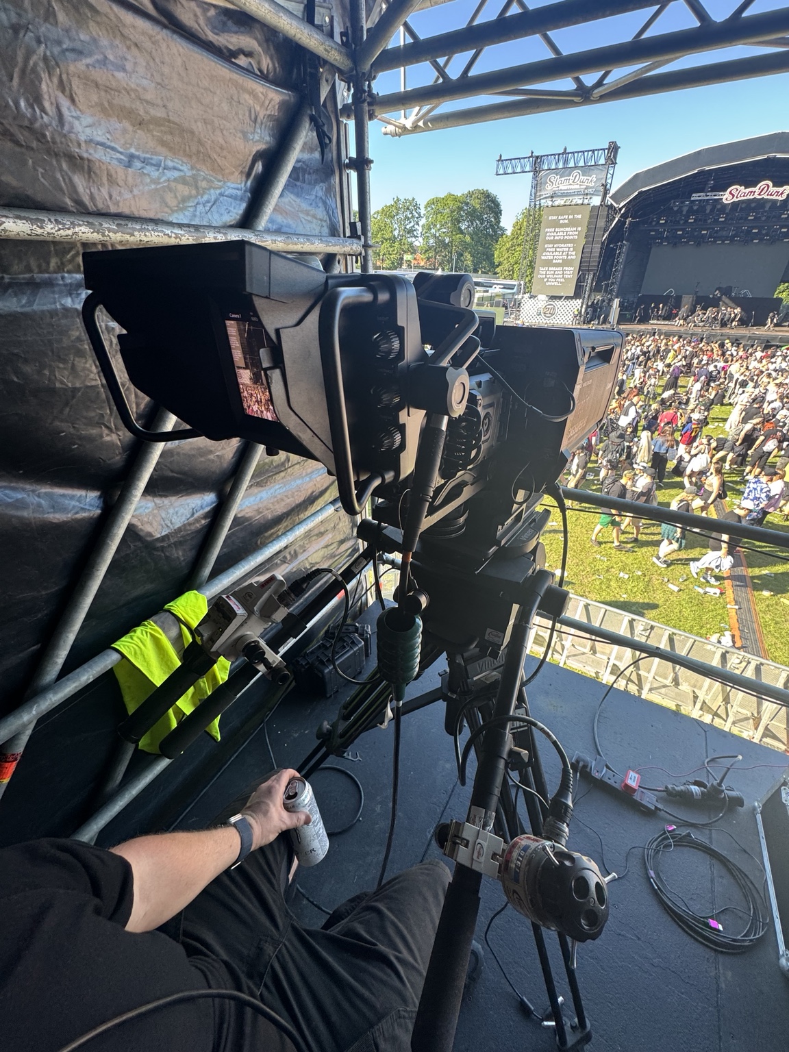 Broadcast camera overlooking crowd